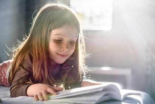 Cute,Girl,Reading,At,Home